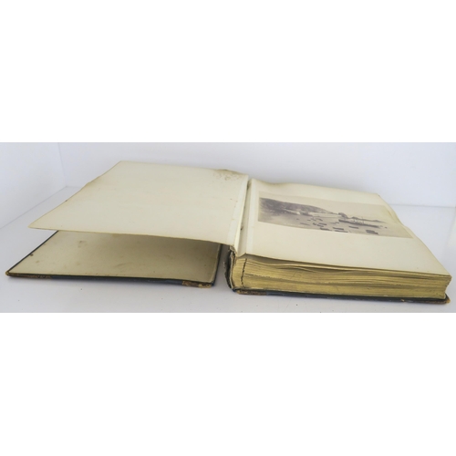 435 - a photographic and country house scrap album comprising; 1890s photographs of Sark, Skye, Aviemore, ... 