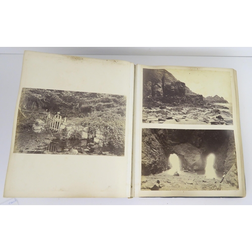 435 - a photographic and country house scrap album comprising; 1890s photographs of Sark, Skye, Aviemore, ... 