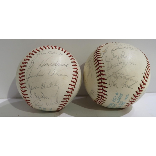 452 - A 1970's Spalding baseball, The Cushioned Cork Center, baseball bearing signatures and another simil... 