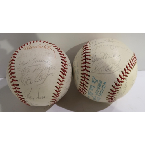 452 - A 1970's Spalding baseball, The Cushioned Cork Center, baseball bearing signatures and another simil... 