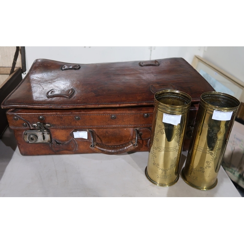 463 - A Chinese leather suitcase, and two WWI brass trench art shells engraved with France and Belgium 191... 