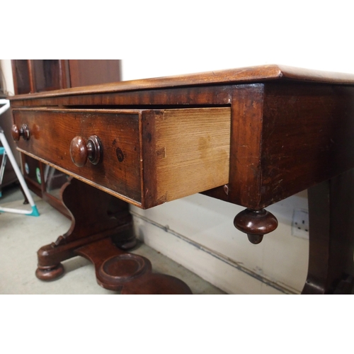 104 - A Victorian mahogany two drawer console table on stretchered base, 76cm high x 114cm wide x 56cm dee... 