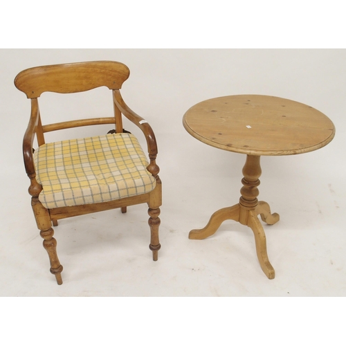 113 - A mahogany framed wingback armchair, beech framed armchair and a pine circular top table (3)