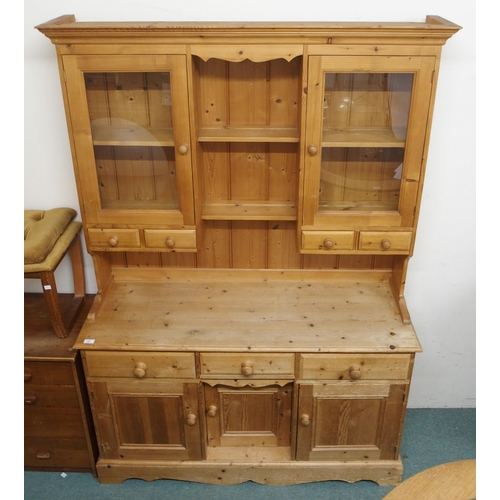 131 - A 20th century pine kitchen dresser, 192cm high x 137cm wide x 48cm deep