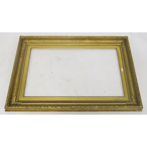 134 - A large 19th century giltwood and gesso picture frame, 98cm x 147cm