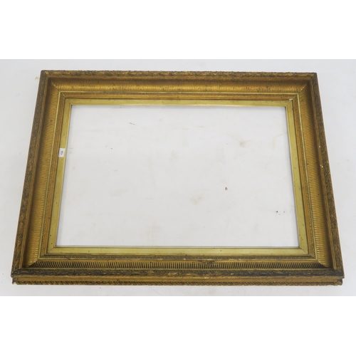 135 - A 19th century gilt gesso picture frame, 118cm x 88cm