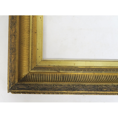 135 - A 19th century gilt gesso picture frame, 118cm x 88cm