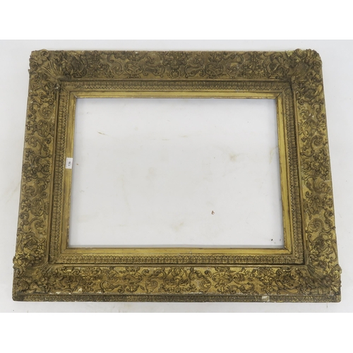 136 - A 19th century gilt gesso picture frame, 105cm x 88cm