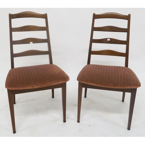 141 - A mid 20th century teak G Plan dining table and four G Plan ladderback dining chairs (5)