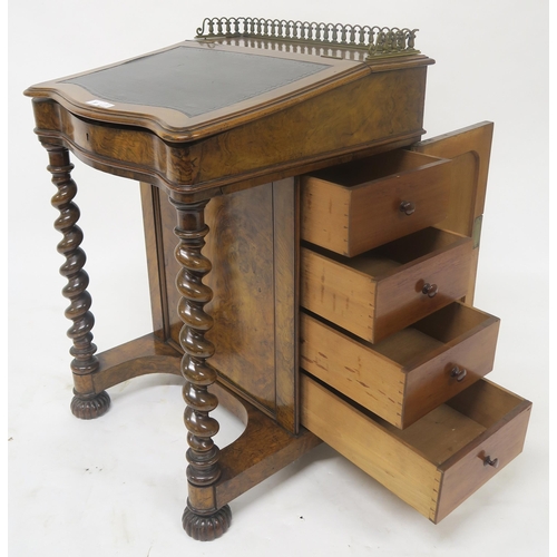 30 - A Victorian walnut Davenport with black leather skiver, barley twist uprights and single cabinet doo... 