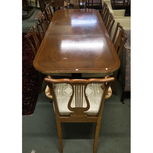 42 - A 20th century mahogany dining suite consisting marble topped serpentine front sideboard, marble top... 