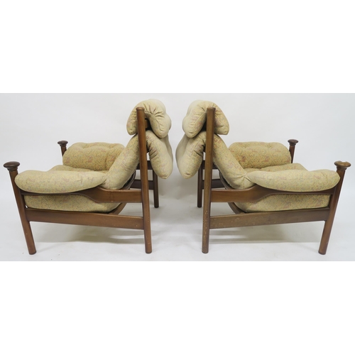 123 - A mid 20th century teak framed Guy Rogers Santa Fe three piece suite with floral buttoned upholstery... 