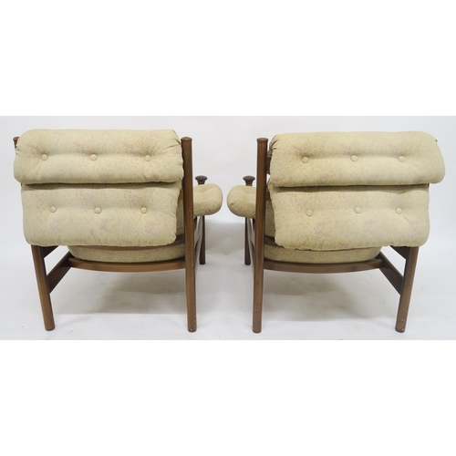 123 - A mid 20th century teak framed Guy Rogers Santa Fe three piece suite with floral buttoned upholstery... 