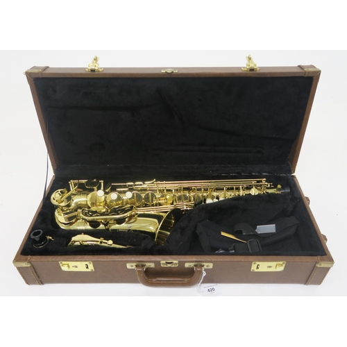 420 - An alto saxophone, The Horn by Trevor J. James & Co serial number TO7558, in brass gold lacquere... 