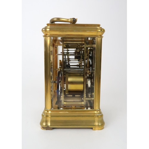 152 - A FRENCH BRASS CARRIAGE REPEATER/ALARM CLOCKwith gilt metal and white enamel dial with Roman numeral... 