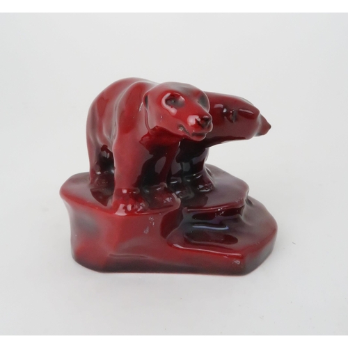 160 - A ROYAL DOULTON FLAMBE GROUP OF A POLAR BEAR AND CUBmodelled by Charles Noke, printed mark to base, ... 