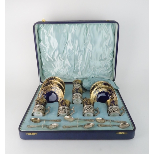 172 - A BOXED SET OF AYNSLEY COFFEE CANS AND SAUCERS the cans with silver mounts, hallmarked for Birm... 