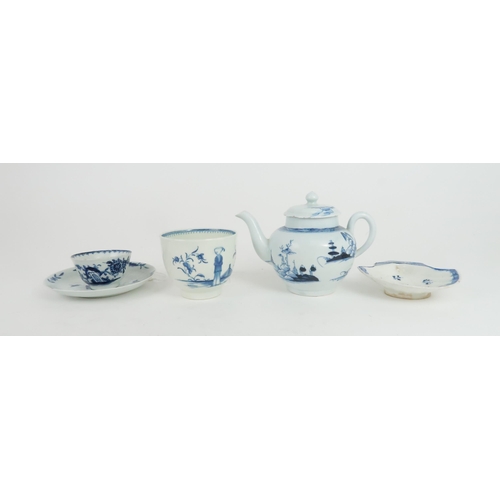 175 - A LIVERPOOL BLUE AND WHITE TEAPOTthe small globular form painted with the Two Men Bowing pattern, 12... 