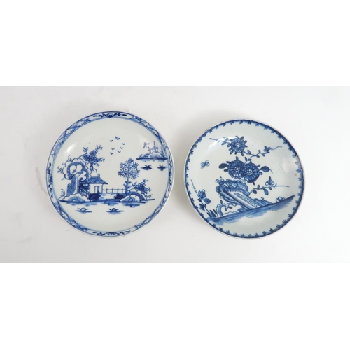 176 - A PENNINGTON LIVERPOOL SAUCERdecorated win blue and white with a peony on a rocky outcrop, 12cm diam... 