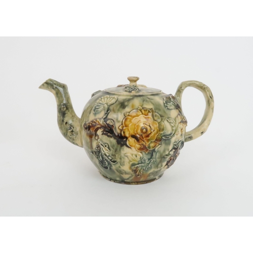 180 - A WHIELDON-TYPE TEAPOTwith applied floral decoration and slip glaze, a Pearlware figure of a lady wi... 