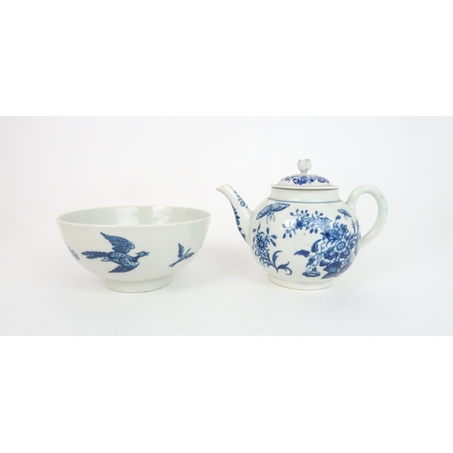 184 - AN EARLY WORCESTER BLUE AND WHITE TEAPOT painted with flowers and foliage and butterflies, cres... 