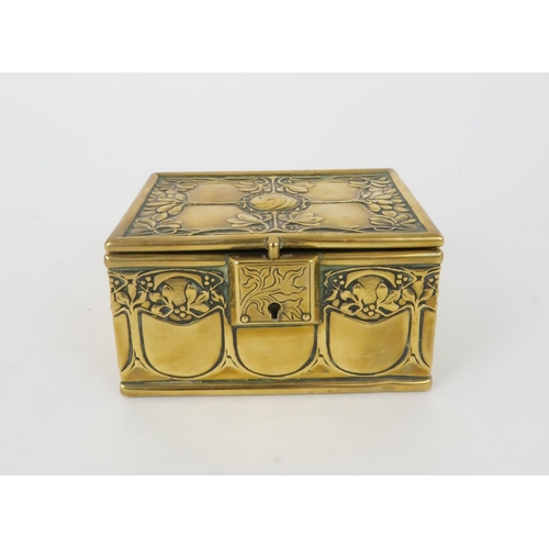 188 - AN ARTS AND CRAFTS BRASS TRINKET BOXdecorated with scrolling foliage and mistletoe, with italic A ma... 