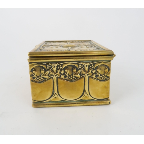 188 - AN ARTS AND CRAFTS BRASS TRINKET BOXdecorated with scrolling foliage and mistletoe, with italic A ma... 