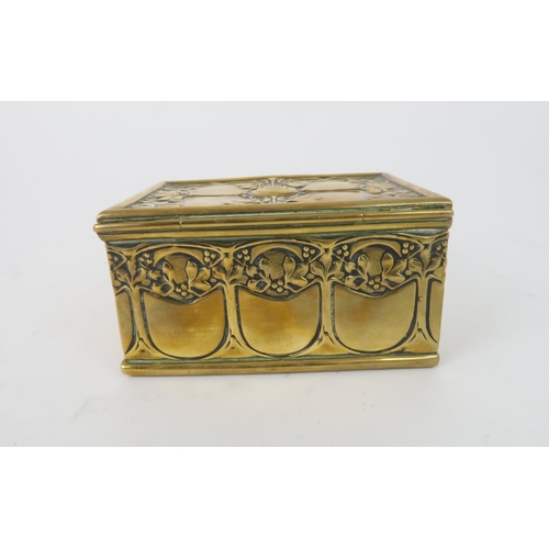 188 - AN ARTS AND CRAFTS BRASS TRINKET BOXdecorated with scrolling foliage and mistletoe, with italic A ma... 