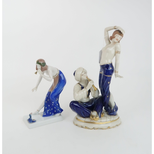 195 - ROYAL DUX MODEL OF A SNAKE CHARMER AND DANCERNo. 3037, 31cm high together with a Rosenthal figure, t... 