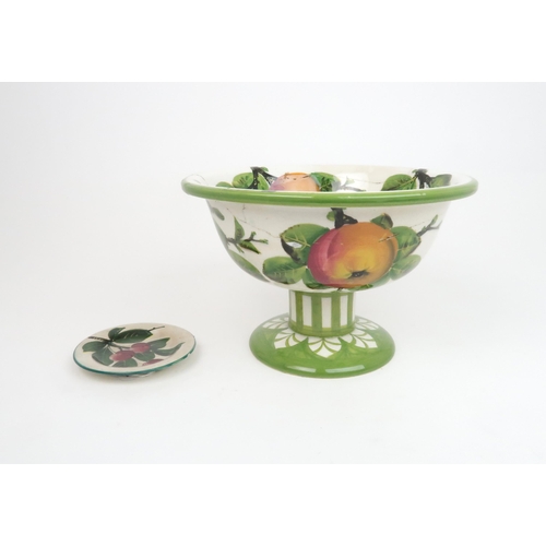 196 - A WEMYSS FOOTED BOWLpainted with apples within a green rim, impressed mark to base, 14cm high, toget... 