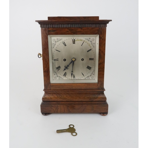 220 - Please note this clock is not a Westminster Chiming clock, but strikes on a gongA WOODEN MANTLE CLOC... 