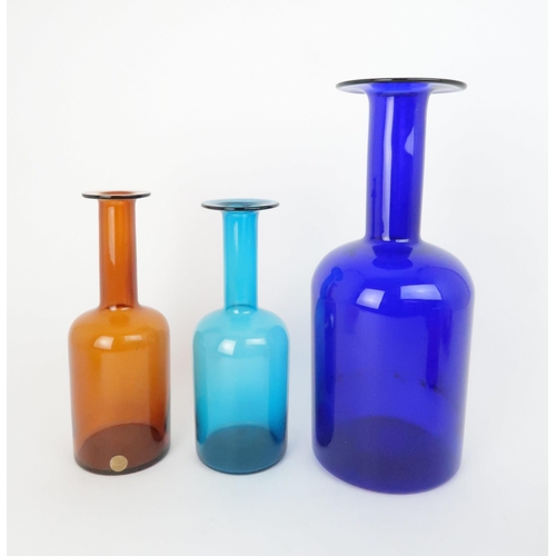 221 - A COLLECTION OF HOLMEGAARD GLASSincluding Otto Brauer Gulvvase vases in amber and  turquoi... 