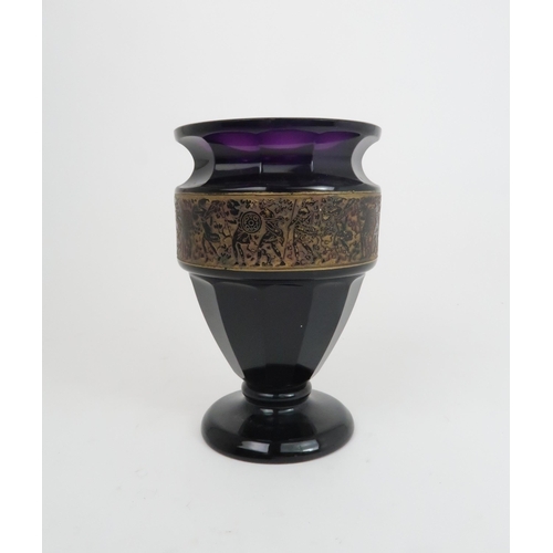 222 - A MOSER KARLSBAD VASEthe amethyst glass with gilded panel of warriors, signed to base, 15.5cm high... 