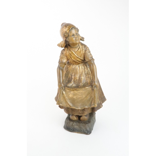 230 - A GOLDSCHEIDER GILDED TERRACOTTA FIGURE OF A DUTCH GIRL, impressed 2995, 38cm high