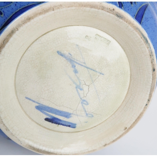 246 - WILLIAM MOORCROFT (1872-1945) TWO HANDLED BOWLdecorated in the Cornflower design on powder blue grou... 