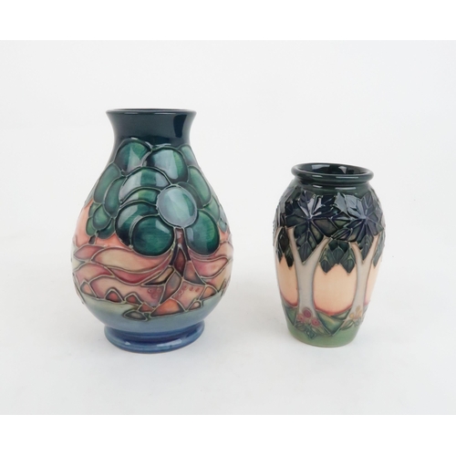 297 - A MOORCROFT MAMOURA VASEdesigned by Sally Tuffin, 1995, 14cm high together with a Cluny pattern vase... 