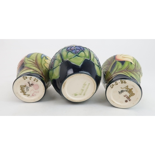 298 - A PAIR OF MOORCROFT ODE TO MAY VASESdesigned by Sian Leeper, signed in gold pen and dated 28.5.05 to... 