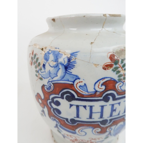 318 - AN ENGLISH DELFT DATED POLYCHROME DRUG-JARof typical shape, painted in blue, green and iron-red, nam... 