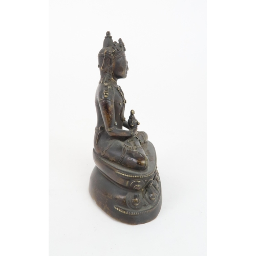 405 - A CHINESE BRONZE MODEL OF BUDDHAseated and wearing a high jewelled crown and holding a vessel, seate... 