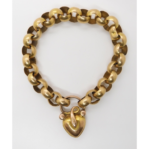 752 - A BRIGHT YELLOW METAL SNAKE BRACELETthe chain is a large open link with a heart shaped locket clasp ... 