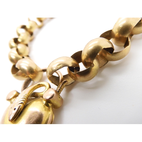 752 - A BRIGHT YELLOW METAL SNAKE BRACELETthe chain is a large open link with a heart shaped locket clasp ... 