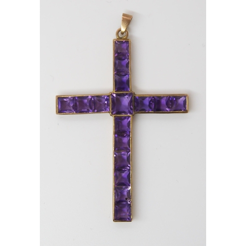 754 - A GOLD & AMETHYST CROSSthe square cut amethysts are set into a galleried mount, stamped 9c to th... 