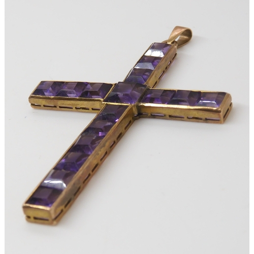 754 - A GOLD & AMETHYST CROSSthe square cut amethysts are set into a galleried mount, stamped 9c to th... 