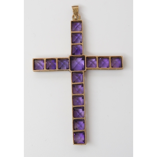 754 - A GOLD & AMETHYST CROSSthe square cut amethysts are set into a galleried mount, stamped 9c to th... 