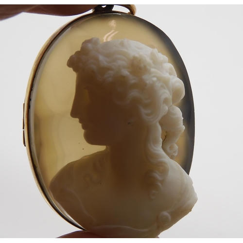 755 - A CRAFTSMAN CARVED AGATE CAMEO OF A MAIDEN mounted as a pendant brooch in yellow metal, dimensions 4... 