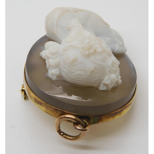 755 - A CRAFTSMAN CARVED AGATE CAMEO OF A MAIDEN mounted as a pendant brooch in yellow metal, dimensions 4... 