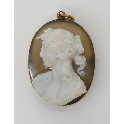 755 - A CRAFTSMAN CARVED AGATE CAMEO OF A MAIDEN mounted as a pendant brooch in yellow metal, dimensions 4... 