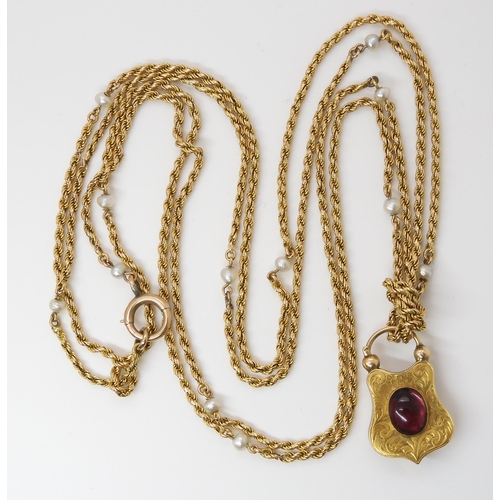 756 - A YELLOW METAL & PEARL GUARD CHAIN WITH GARNET CLASPthe bright yellow metal rope chain, is inter... 