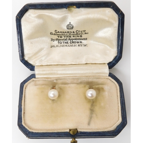 760 - A PAIR OF GARRARD'S PEARL CUFFLINKSmounted in yellow metal the pearls measure approx 5.6mm. In origi... 