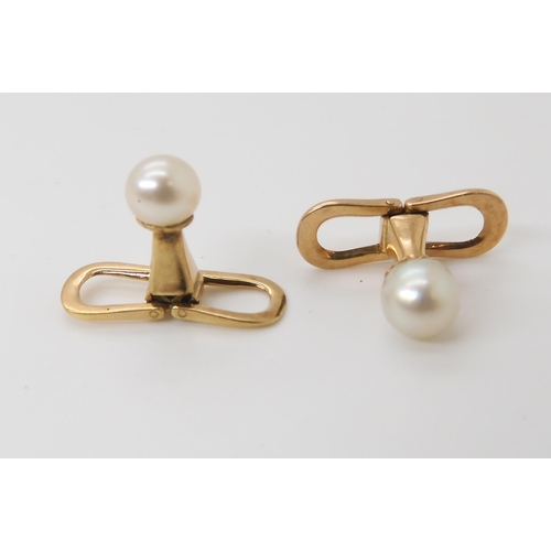 760 - A PAIR OF GARRARD'S PEARL CUFFLINKSmounted in yellow metal the pearls measure approx 5.6mm. In origi... 